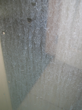 old shower door with hard water stain - glass doors sacramento