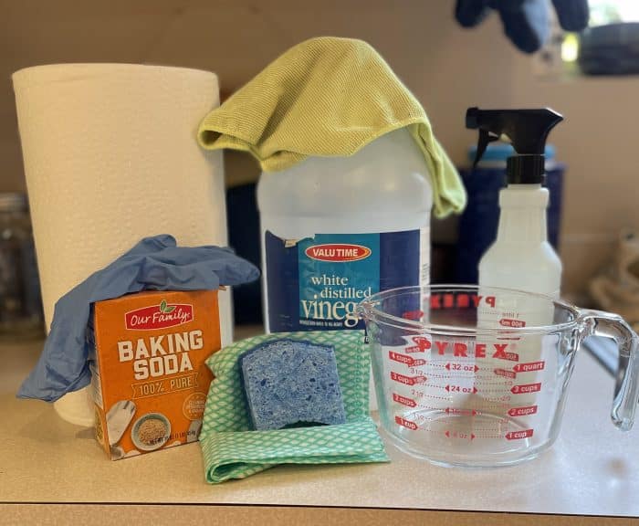 supplies to clean hard water stains from shower glass